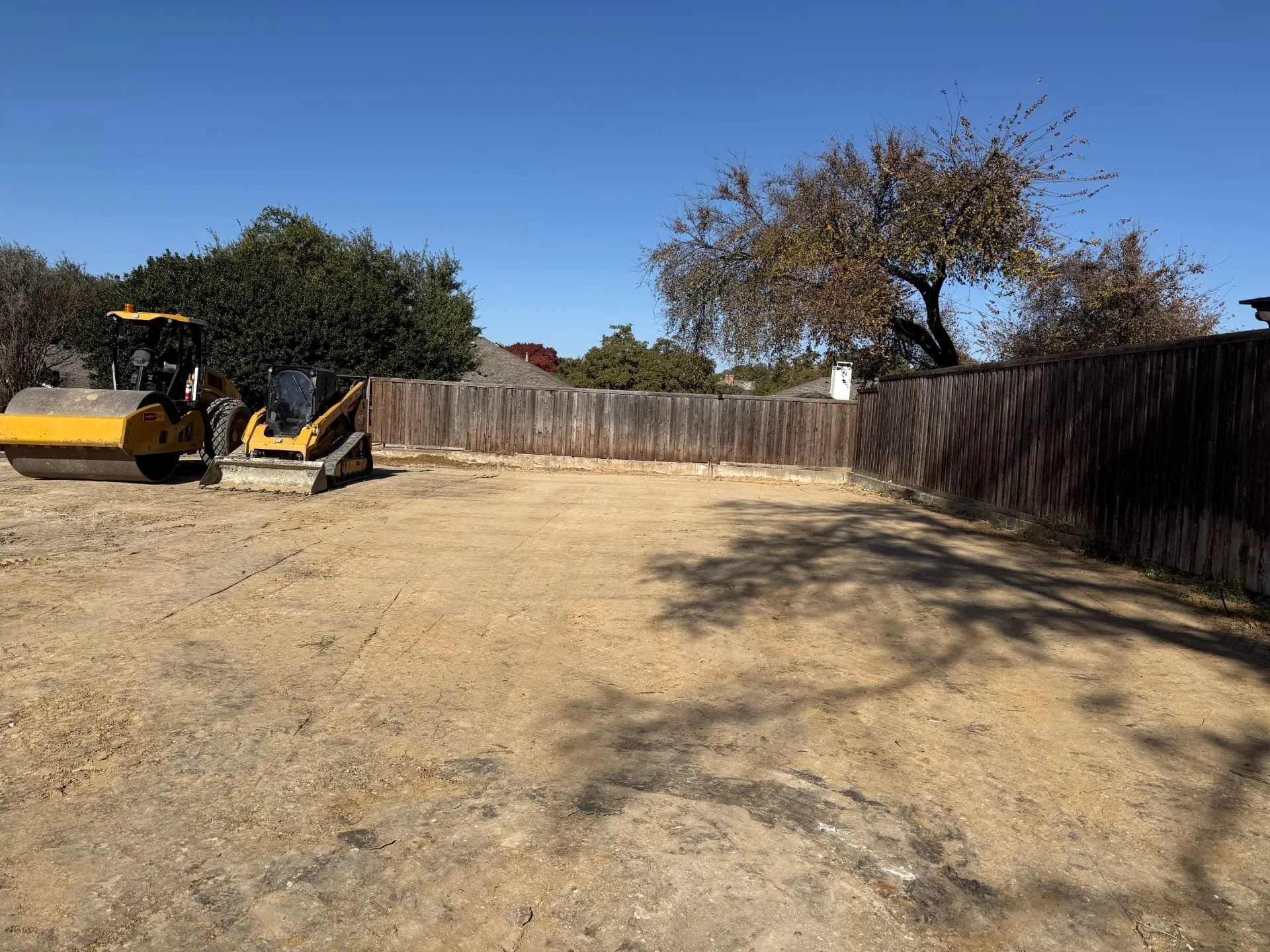 Leveled backyard after an in-ground pool fill-in project in Dallas, Texas